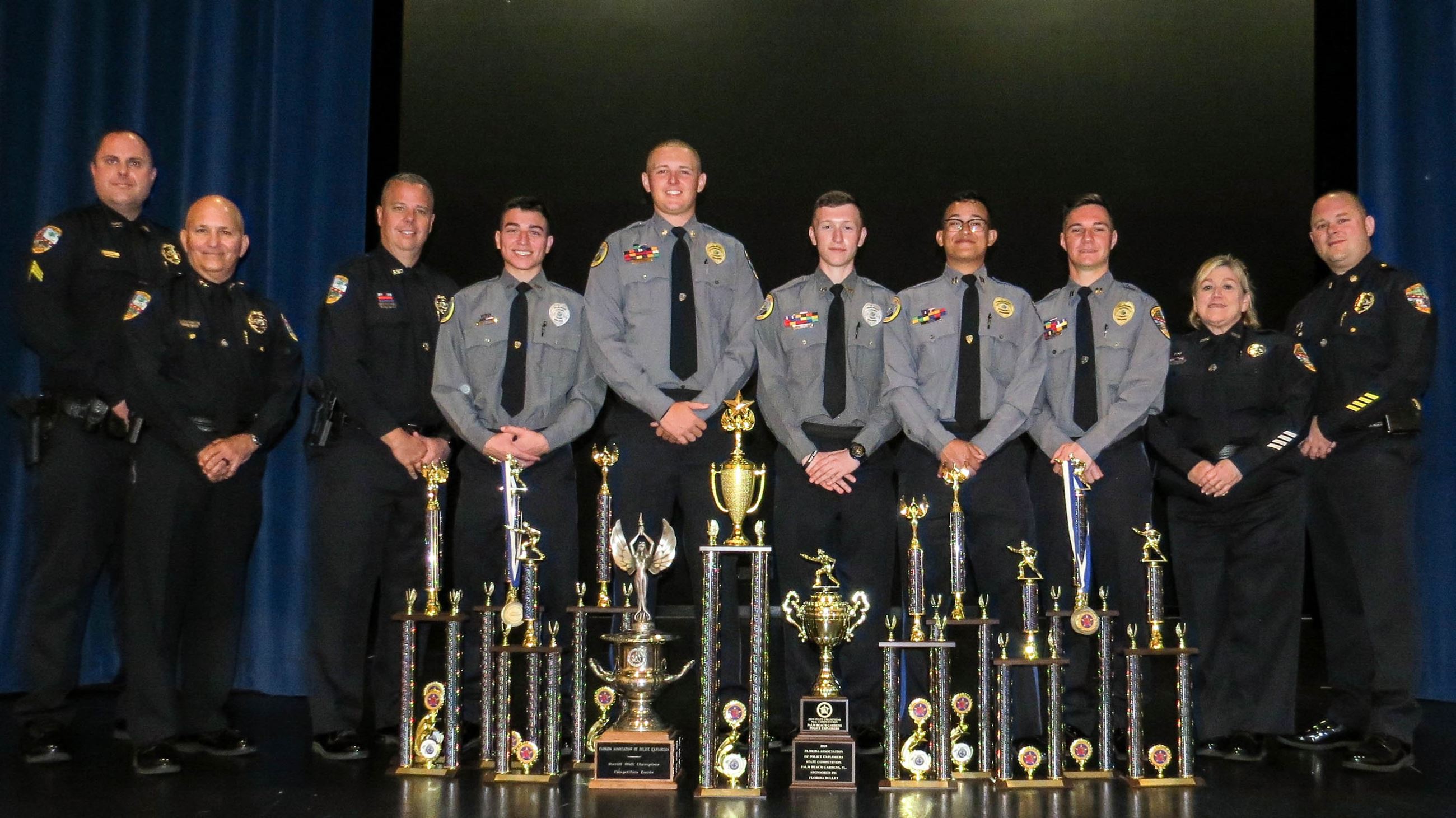 Police Explorers Displaying Trophies from State Competition 