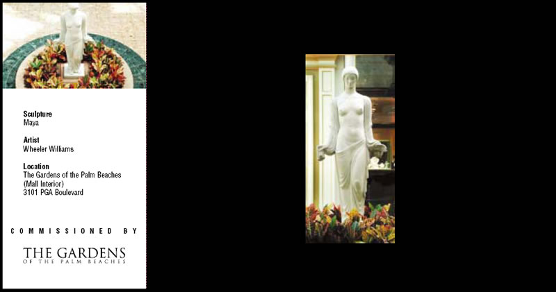 Statue of woman with robe falling down to waste